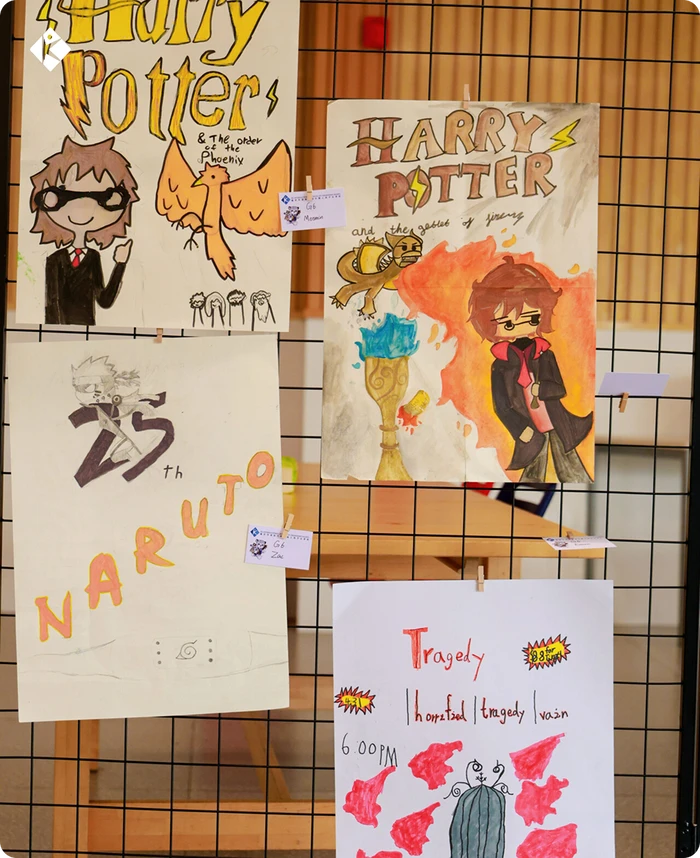 Student fan-art drawings, from Harry Potter to Naruto themes, at the KLIS art exhibition