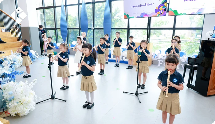 KLIS early years students playing recorders in an ensemble at the Music & Art Festival