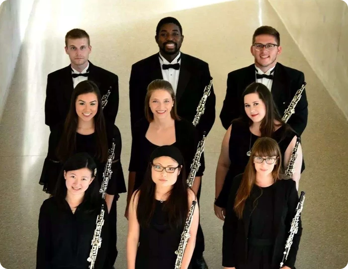 Oboe chamber music ensemble group photo in formal concert attire